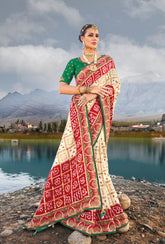 Pure gazzi off white hand weaved saree with real mirror, moti & cut dana work hand embellished work